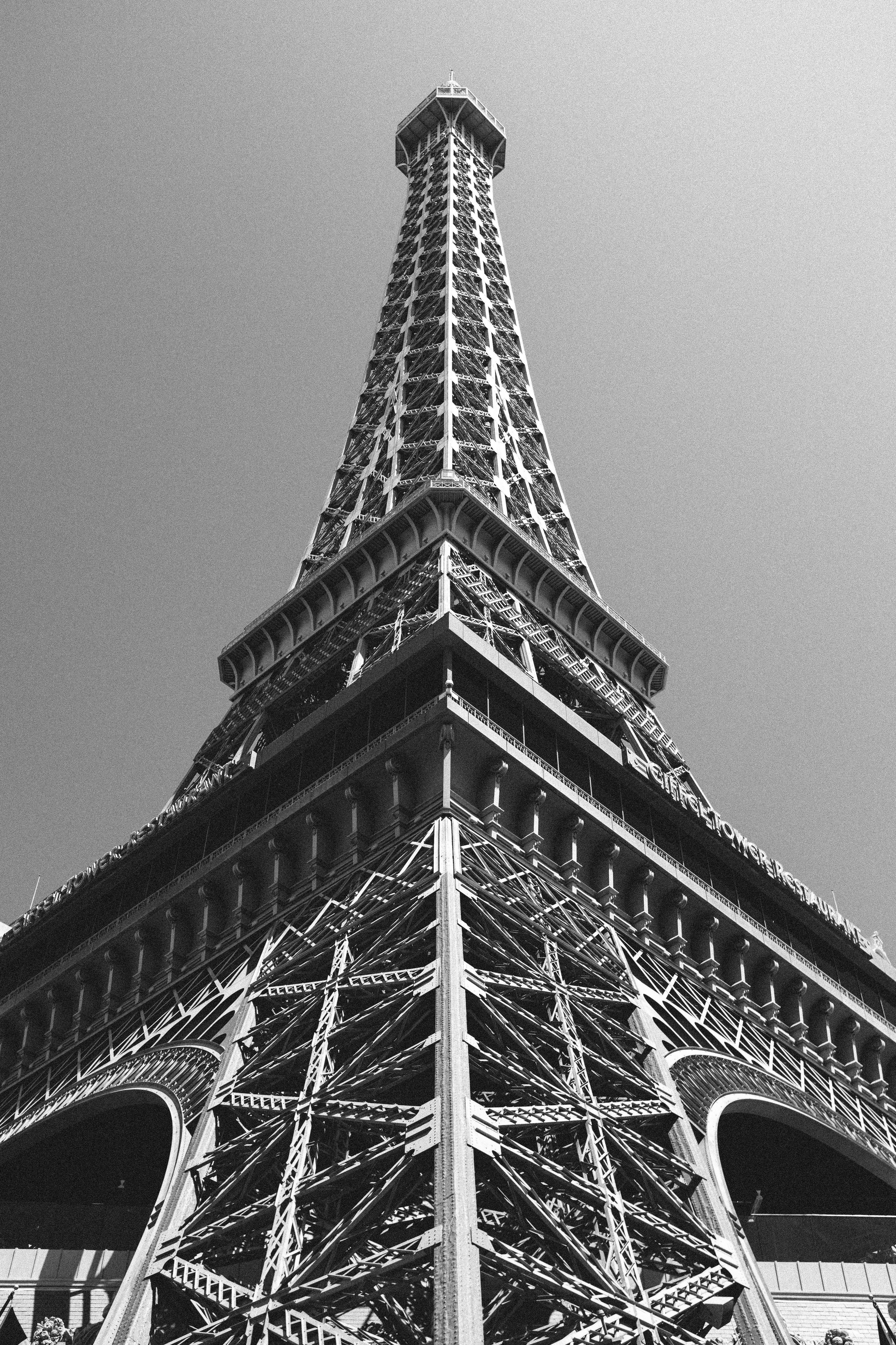 grayscale photo of Eiifel Tower in Paris France